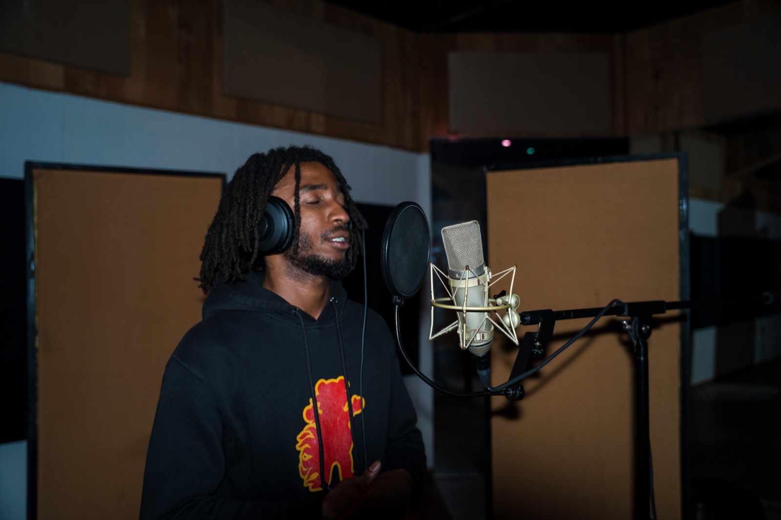 Artist recording vocals in Studio A